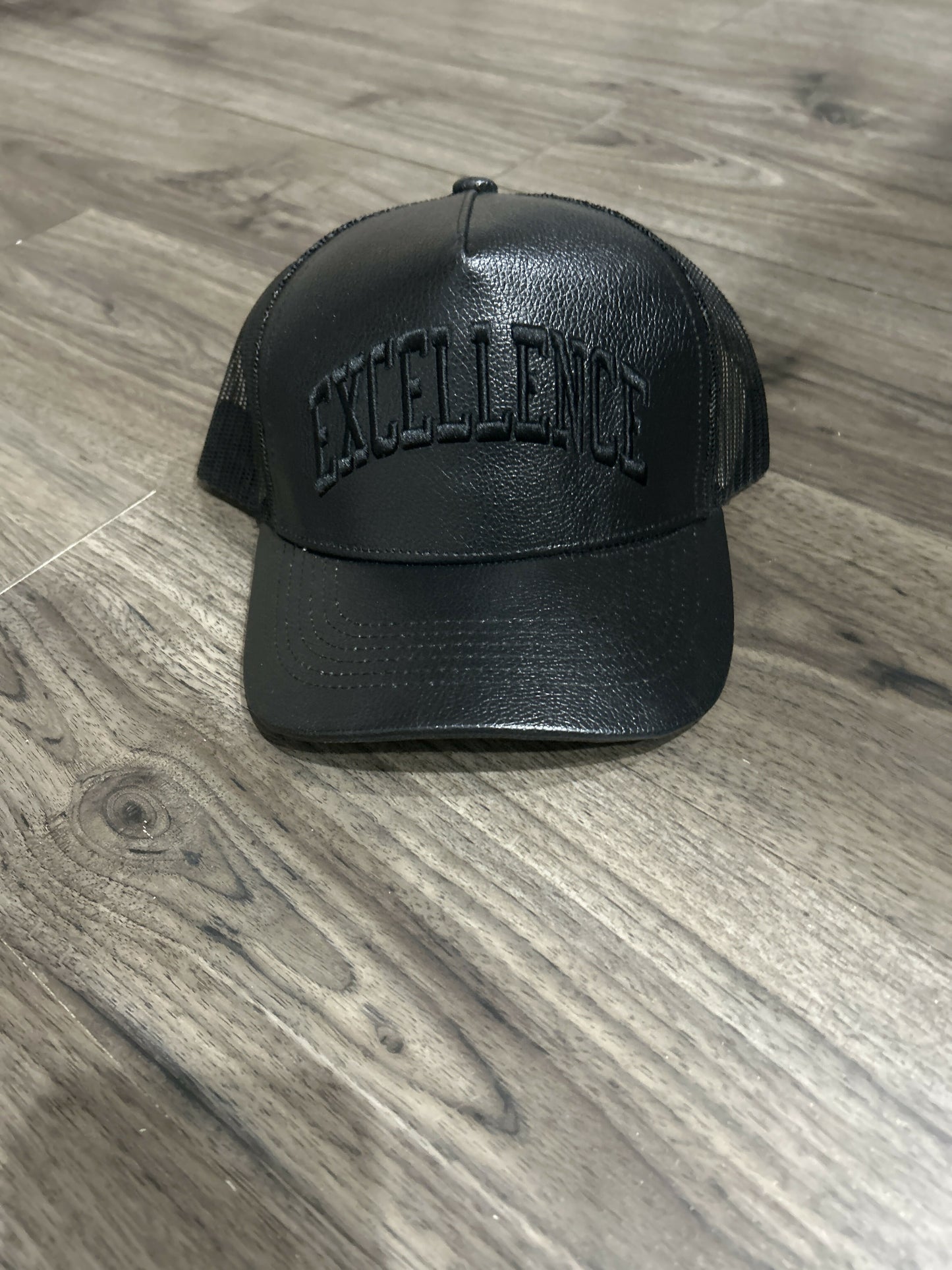 Black Excellence Leather Trucker