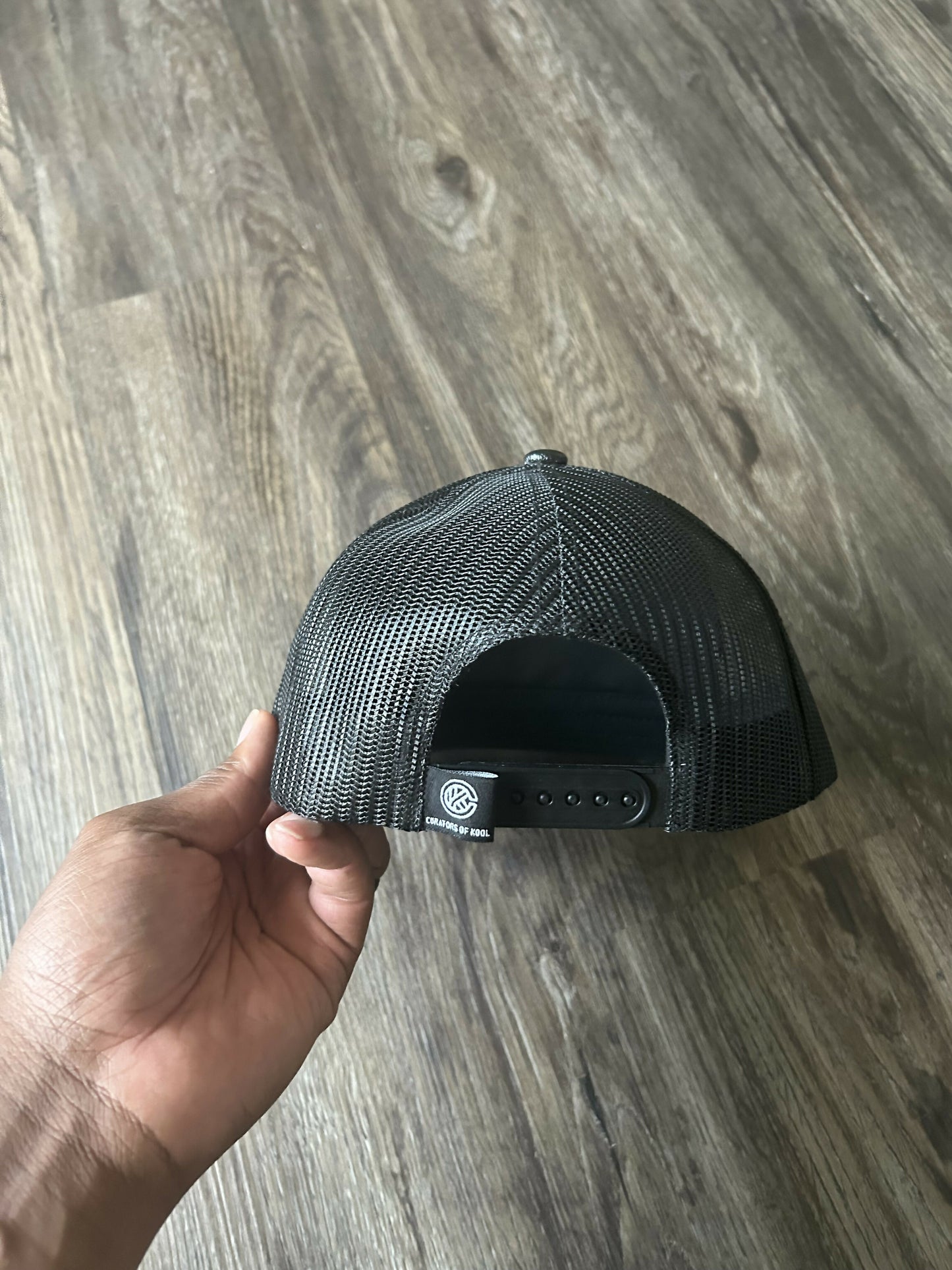 Black Excellence Leather Trucker
